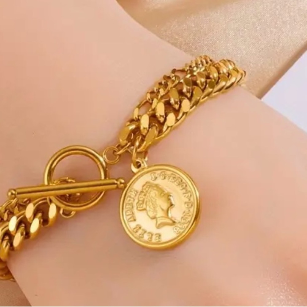 Elegant Gold Bracelet with Coin Charm